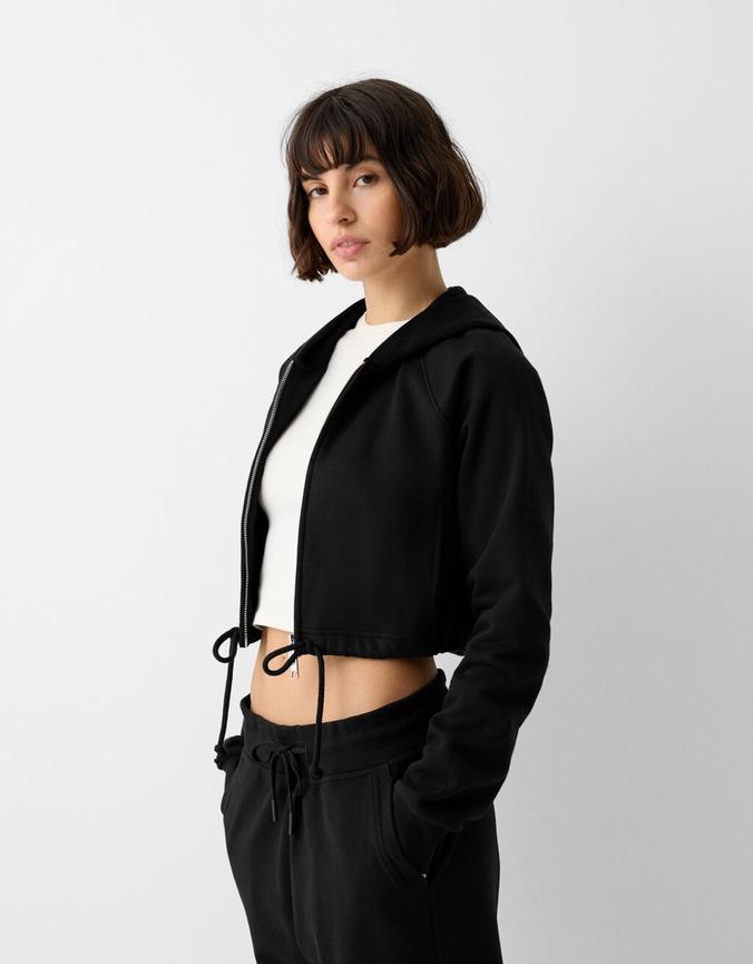 Cropped zip-up hoodie offers at £19.99 in Bershka