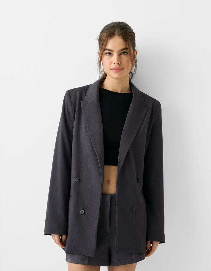 Slim-fit flowing double-breasted blazer offers at £35.99 in Bershka