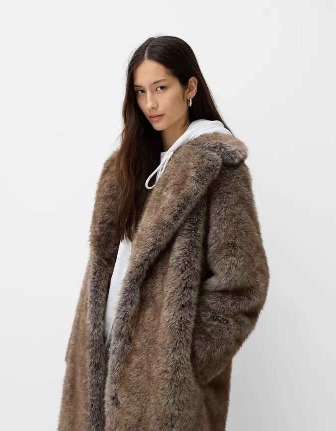 Long faux fur coat offers at £119 in Bershka