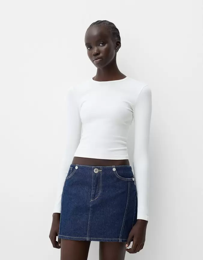 Denim mini skirt offers at £39.99 in Bershka