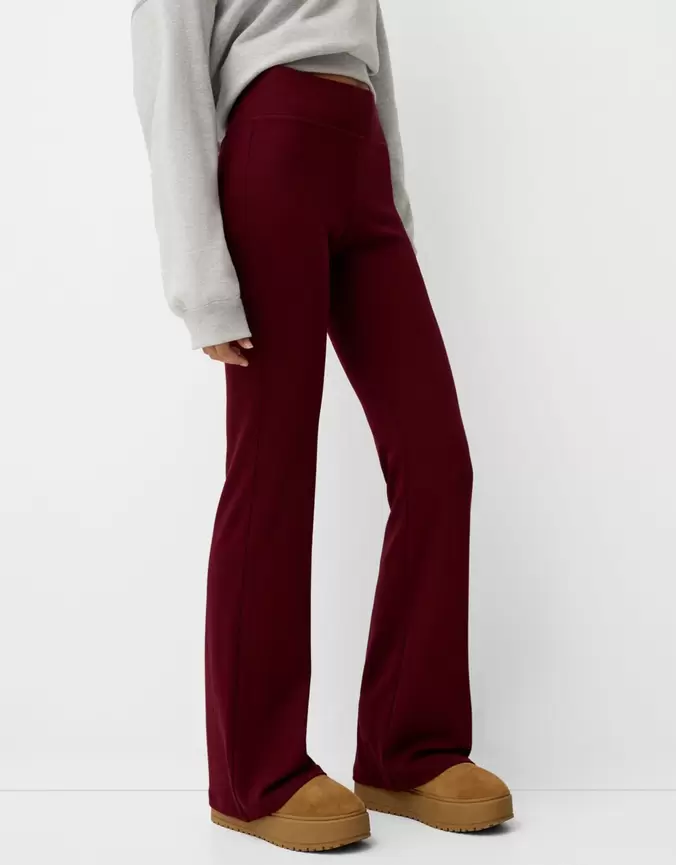 Ribbed waist flared trousers offers at £22.99 in Bershka