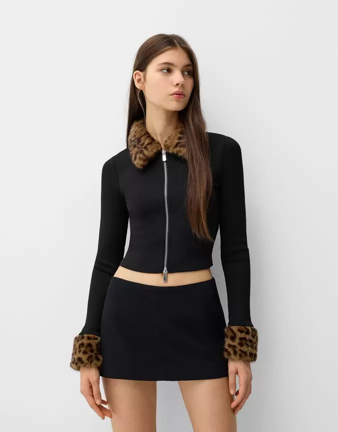 Jacket with animal print on the cuffs and collar offers at £35.99 in Bershka