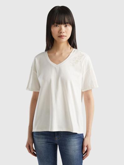 T-shirt with floral embroidery offers at £15.95 in United Colors Of Benetton