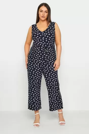 Evans Black Daisy Print Wide Leg Jumpsuit offers at £15 in Evans