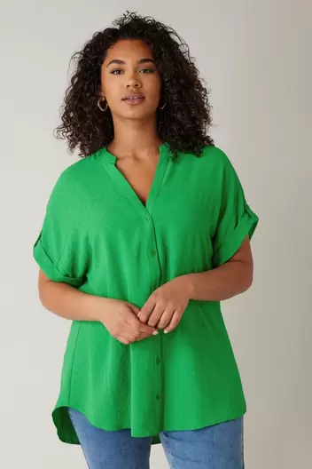 EVANS Curve Green Short Sleeve Blouse offers at £10 in Evans