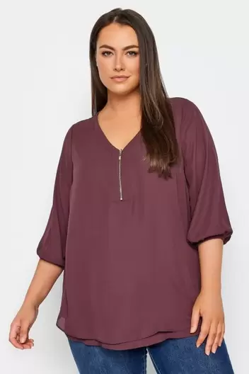 Evans Purple Zip Neck Puff Sleeve Blouse offers at £15 in Evans