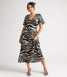 Urban Bliss Black Zebra Print Midaxi Dress offers at £15 in New Look