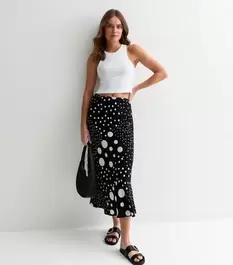 Black Spot Print Bias Cut Midi Skirt offers at £15 in New Look