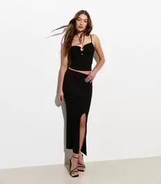 Black Ribbed Knit Split Hem Midi Skirt offers at £18 in New Look