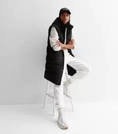 Black Long Hooded Puffer Gilet offers at £27 in New Look