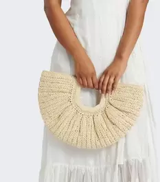 South Beach Beige Woven Clutch Bag offers at £22.4 in New Look