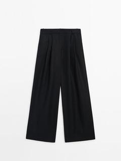 Straight fit double dart trousers offers at £99.95 in Massimo Dutti