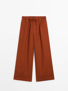 100% linen trousers with elasticated waistband offers at £89.95 in Massimo Dutti