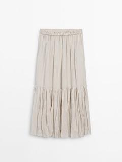 Pleated ramie blend midi skirt offers at £99.95 in Massimo Dutti