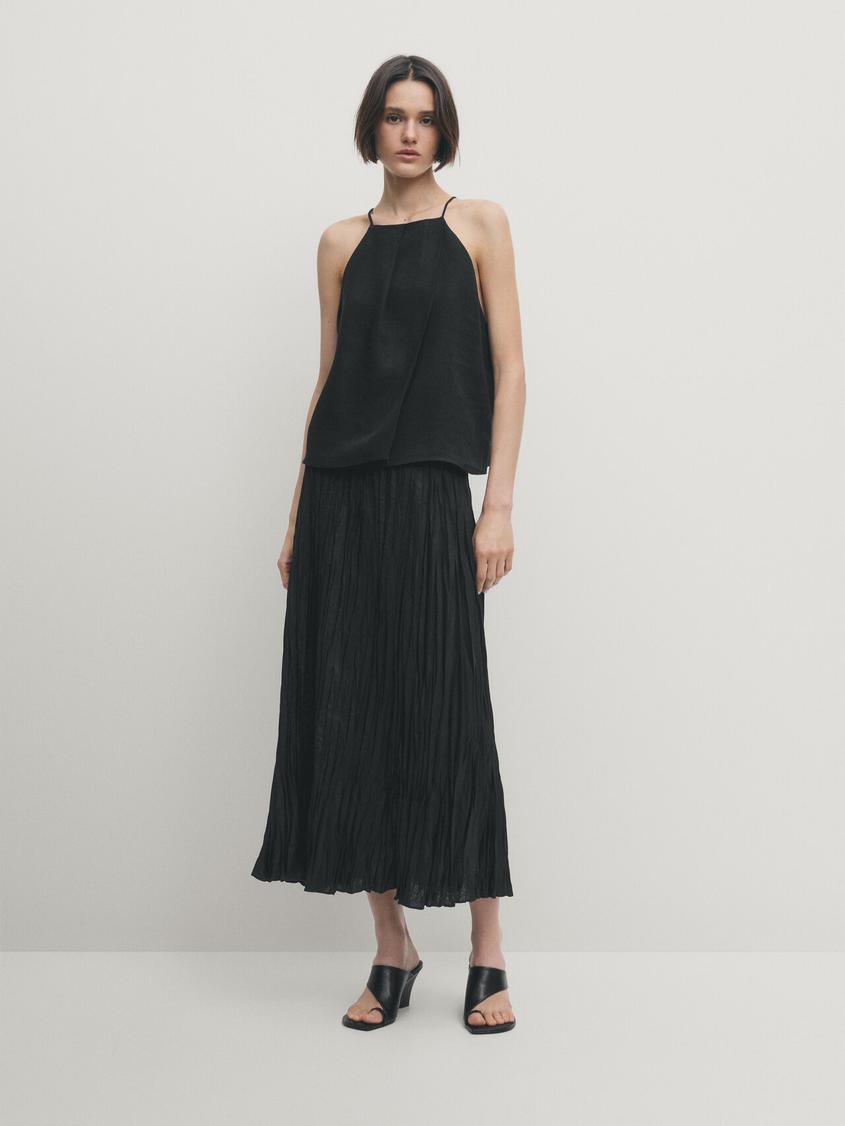 Pleated black midi skirt offers at £59.95 in Massimo Dutti