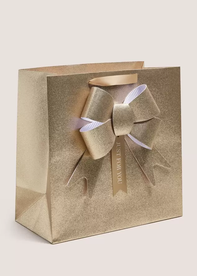 Winter Poem Gold Bow Gift Bag offers at £2.8 in Matalan