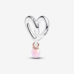 Mum Two-tone Wrapped Heart Charm offers at £25 in Pandora