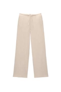 Loose-fitting rustic trousers offers at £22.99 in Pull & Bear