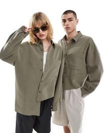 Reclaimed Vintage asym genderless shirt with seam detailing in olive green offers at £37.99 in ASOS
