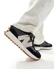 New Balance 327 sneakers in black and grey - exclusive to ASOS - BLACK offers at £91 in ASOS