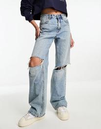 Stradivarius wide leg dad jean with rips in medium blue offers at £23.99 in ASOS