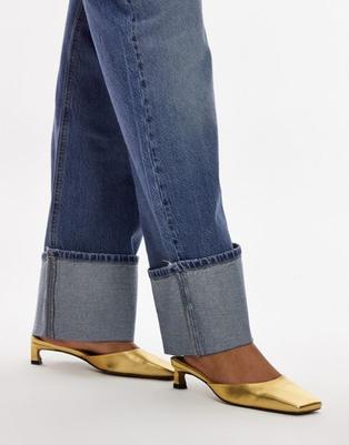Topshop Audrey premium leather mid heeled square toe mules in gold offers at £68 in ASOS