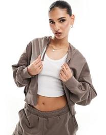 The Couture Club co-ord emblem relaxed zip through hoodie in brown offers at £71.25 in ASOS