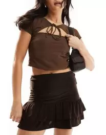 COLLUSION mini skirt with ruffle detail in brown offers at £29.99 in ASOS