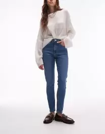 Topshop high rise Jamie jeans in mid blue offers at £45 in ASOS