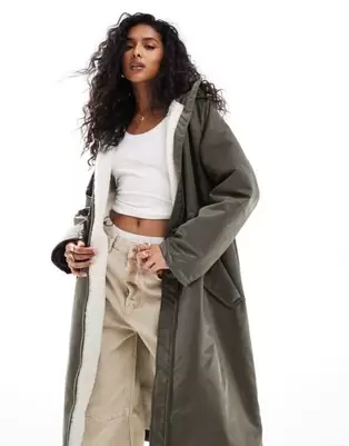 ASOS DESIGN borg lined longline rain coat in khaki offers at £65 in ASOS