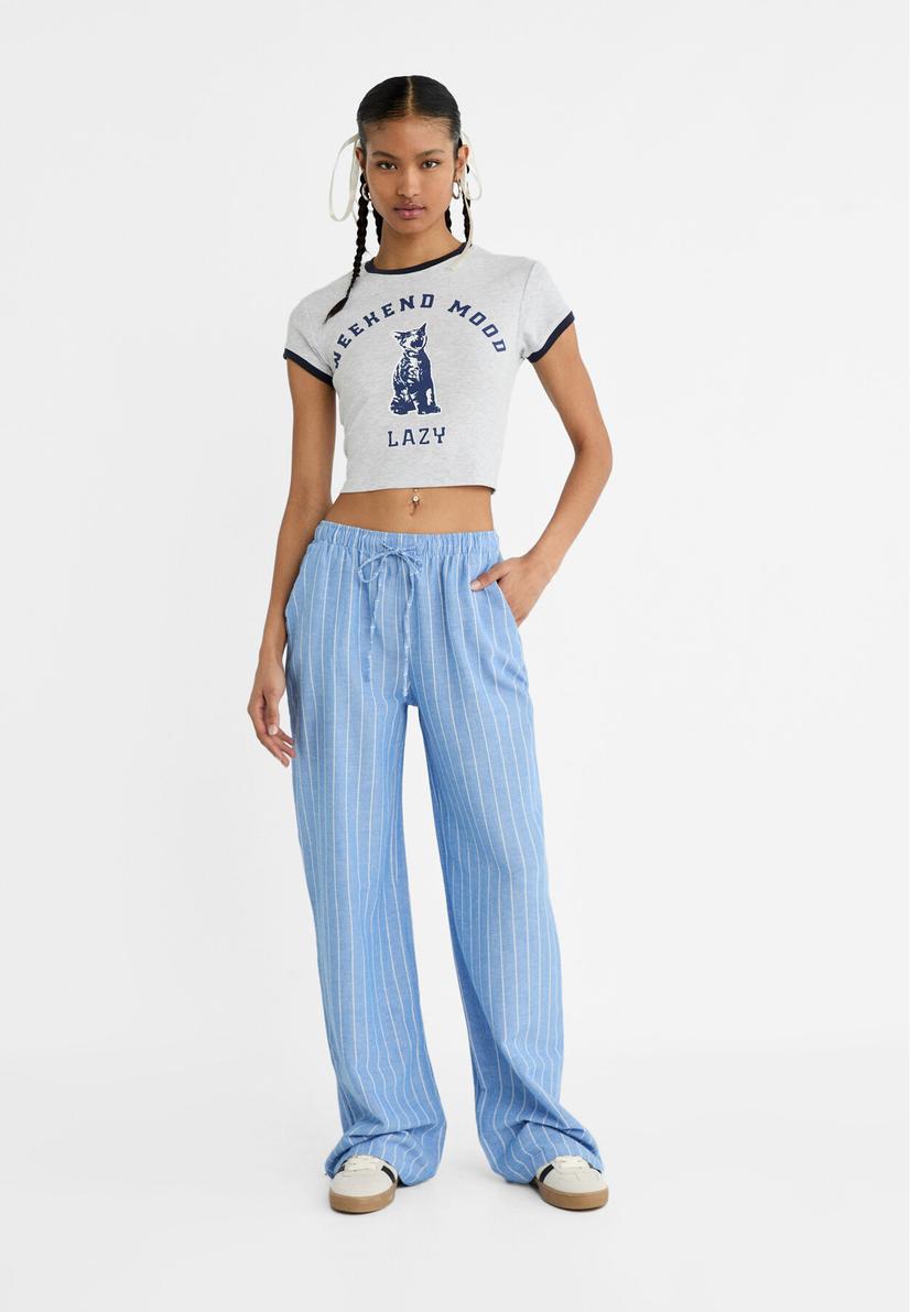Striped relaxed fit linen blend trousers offers at £25.99 in Stradivarius