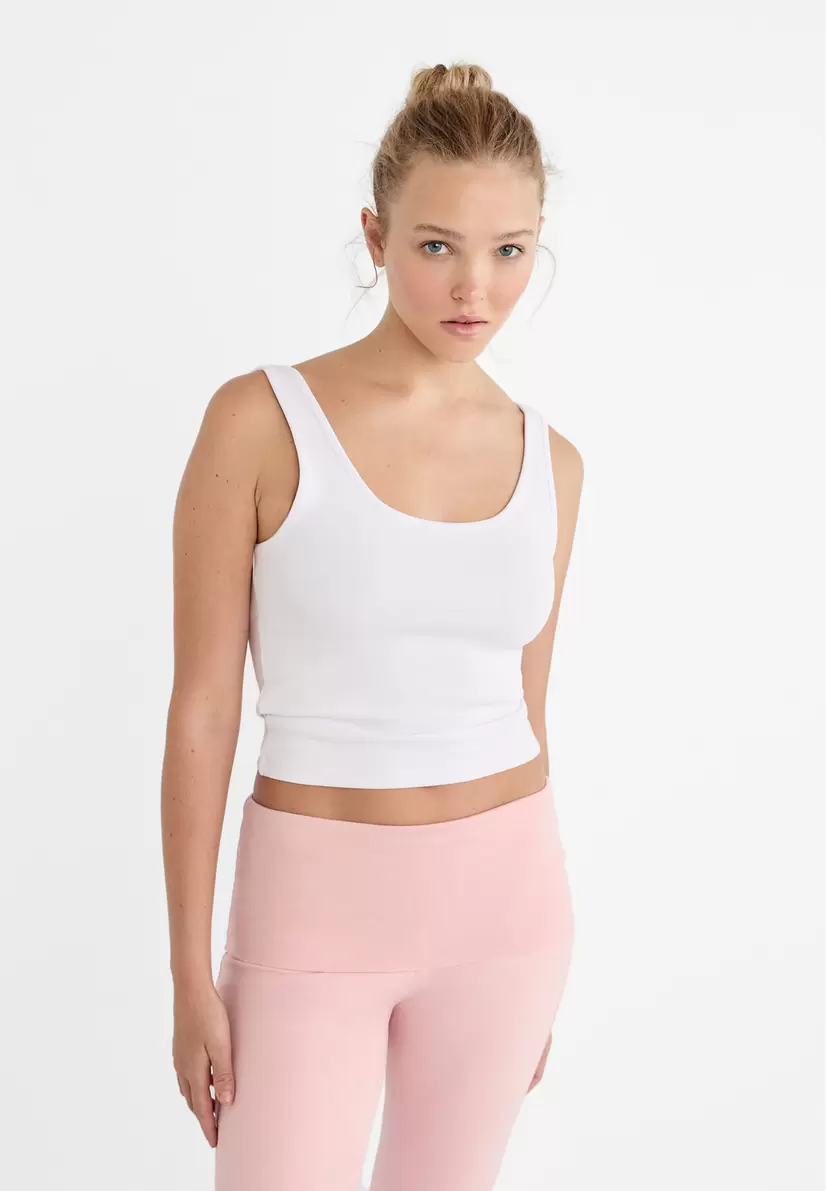 Basic tank top offers at £12.99 in Stradivarius