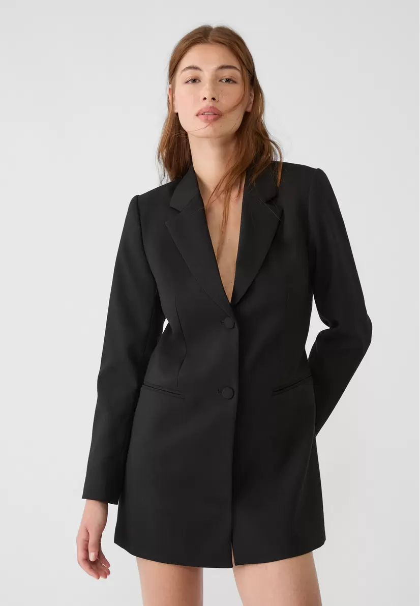 Blazer playsuit with a low-cut back offers at £59.99 in Stradivarius