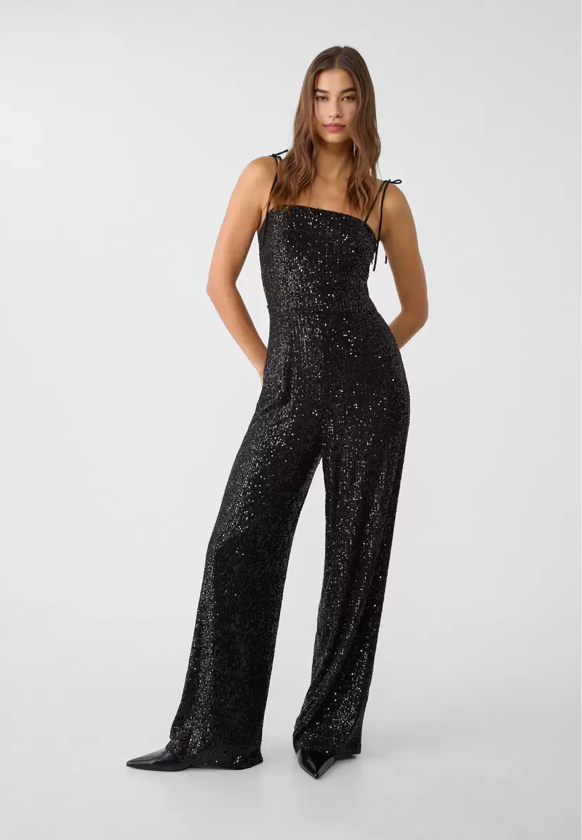 Sequinned bandeau jumpsuit offers at £59.99 in Stradivarius