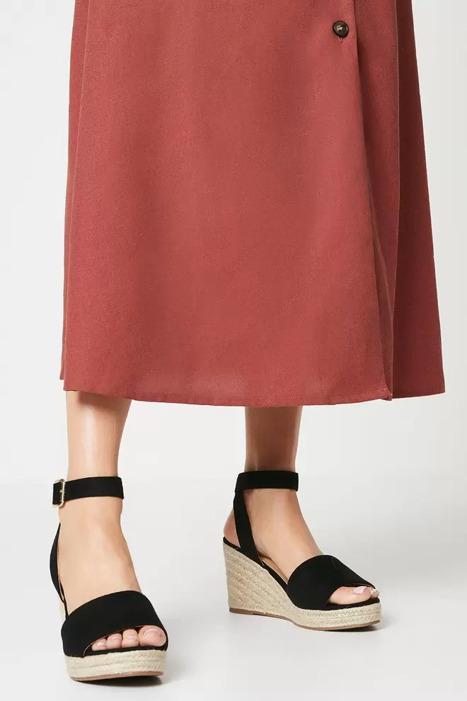 Wide Fit Rebekah Peep Toe Wedges offers at £13.5 in Dorothy Perkins