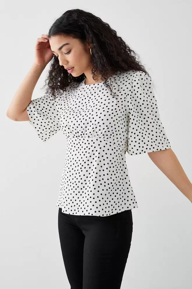 Ivory Spot Angel Sleeve Tea Blouse offers at £14.5 in Dorothy Perkins