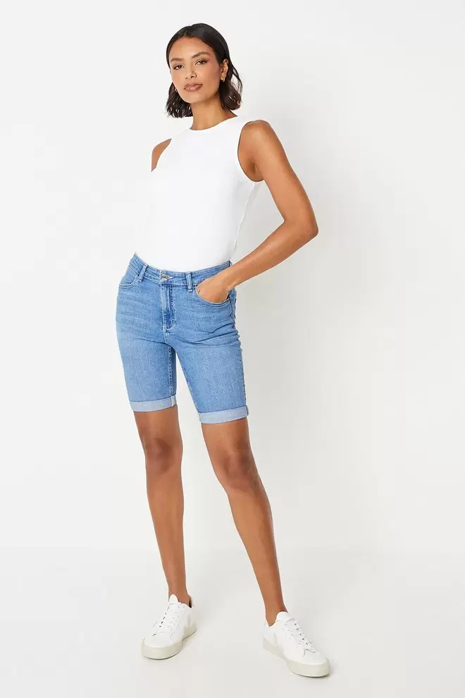 Petite Stretch Denim Knee Shorts offers at £10 in Dorothy Perkins