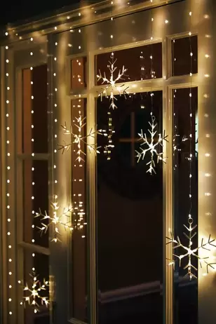 LED Snowflake Curtain - Warm White offers at £19.99 in Frosts Garden Centres