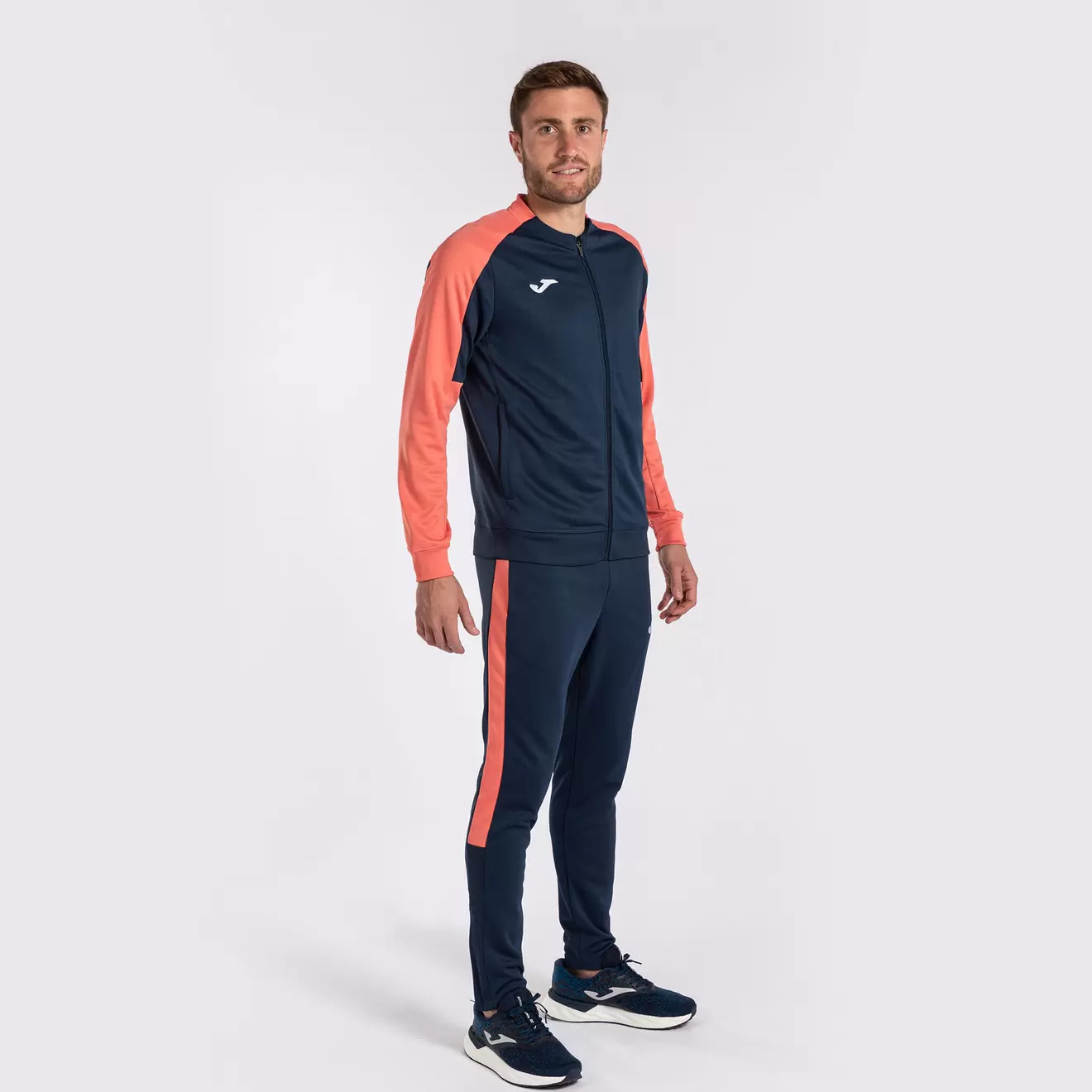 Tracksuit man Eco Championship navy blue fluorescent orange offers at £55.49 in Joma